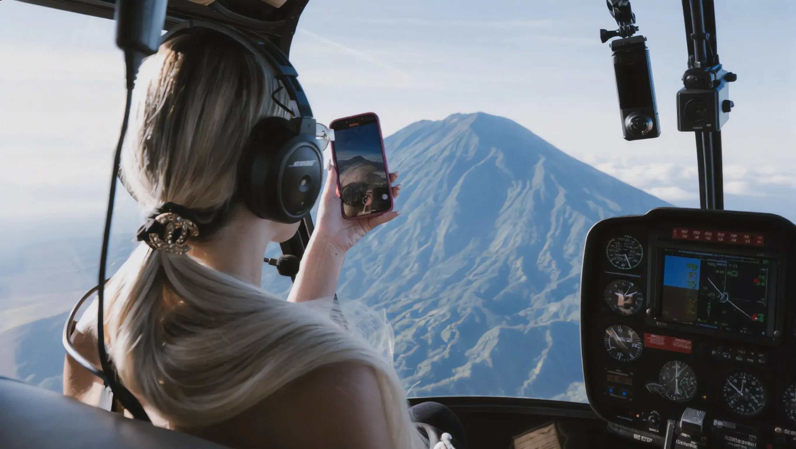 Helicopter transfer over crystal clear waters between Bali islands